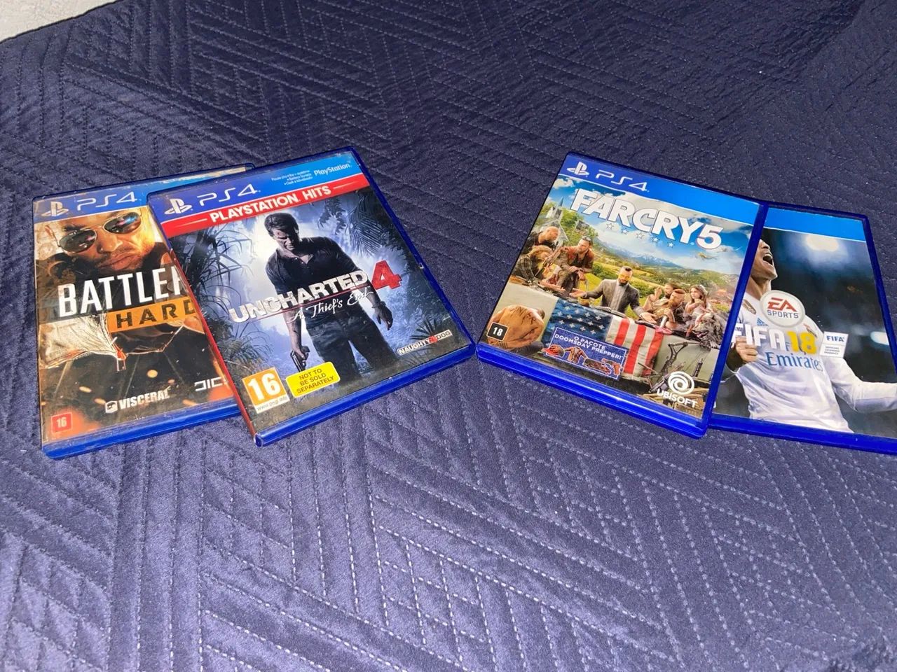 (NEGOCIÁVEL) 4 jogos PS4 - Uncharted 4, Far Cry 5, Battlefield Hardline e FIFA 18