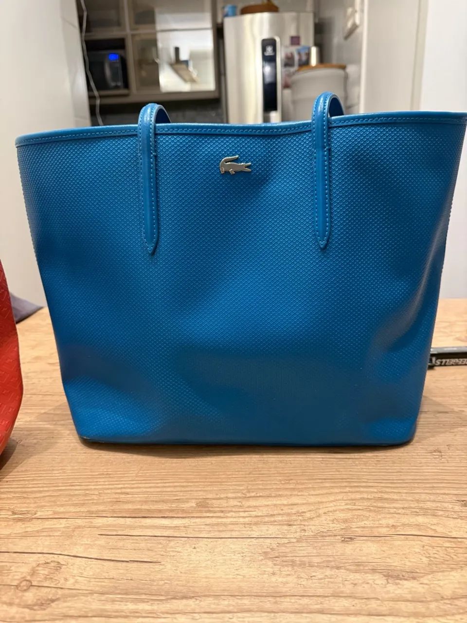 Bolsa Lacoste couro