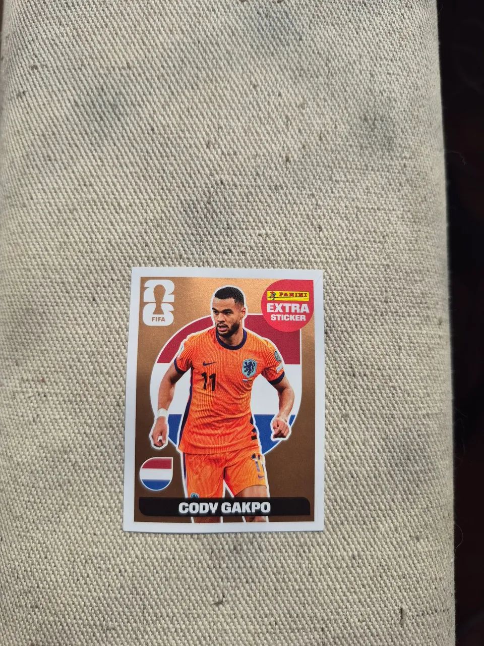 Extra sticker - Cody Gakpo - Bronze - Esportes de Quadra e Ao Ar