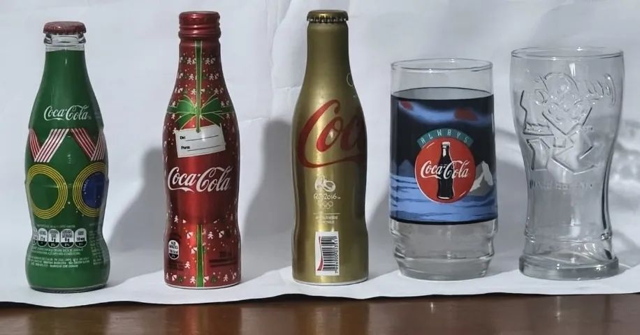 Garrafas de coca cola lacradas  e Copos da Coca Cola