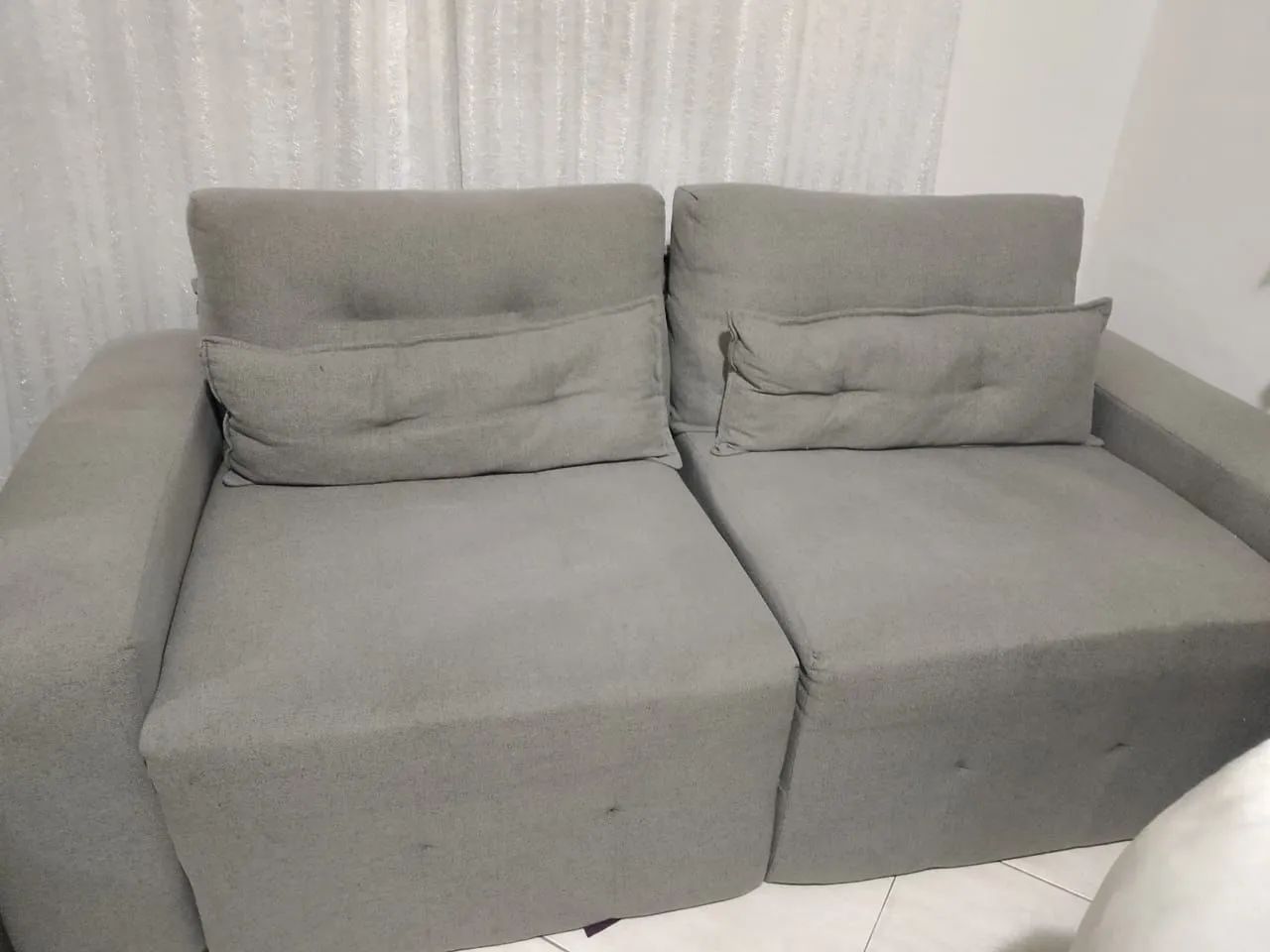 Sofá com pufs