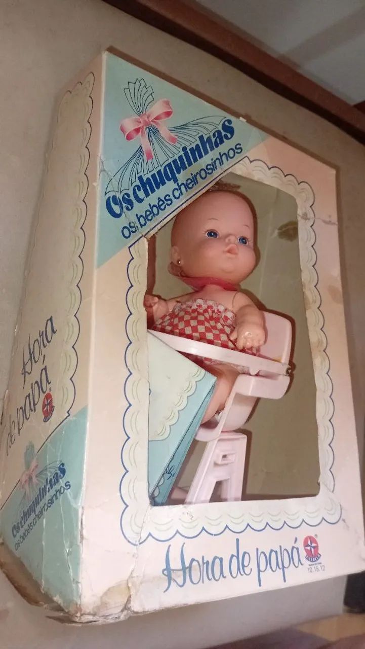 Boneca chuquinha da estrela na caixa