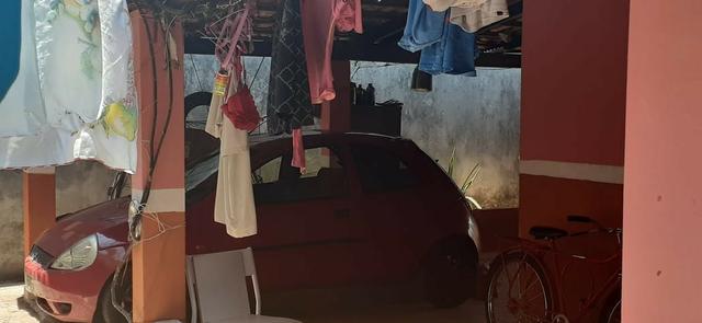 Vendo uma casa na arniqueiras ao lado do areal 230 mil - Foto 5