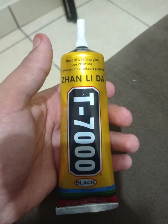 Vendo cola pra celular T-7000