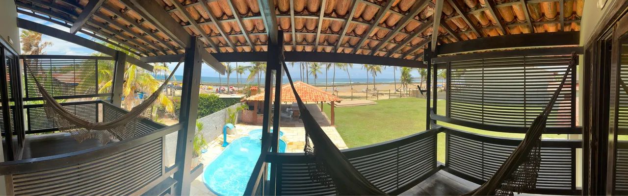Casa de Praia beira-mar com churrasqueira, piscina, lazer e 8 quartos