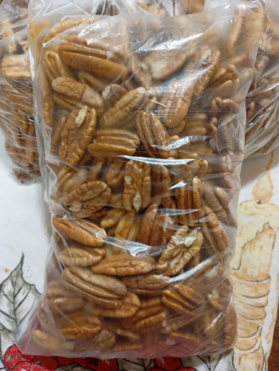 Nozes pecan descascada e selecionadas