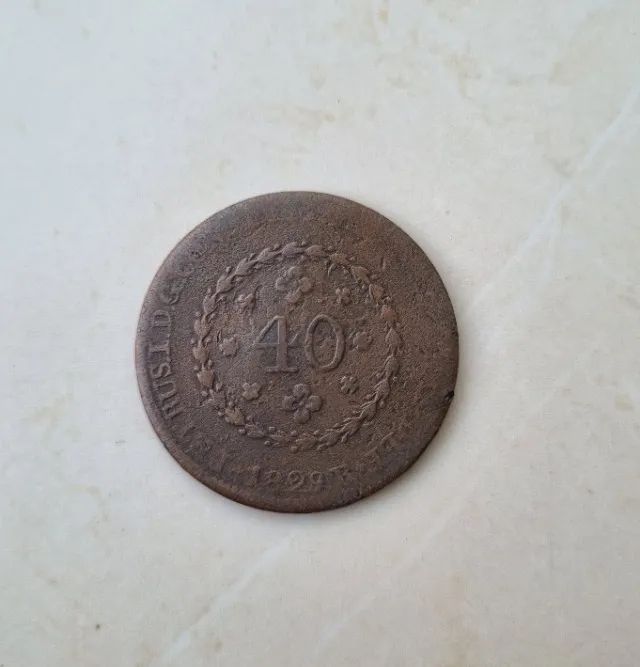 Moedas raras de 40 e 20 reis bronze.