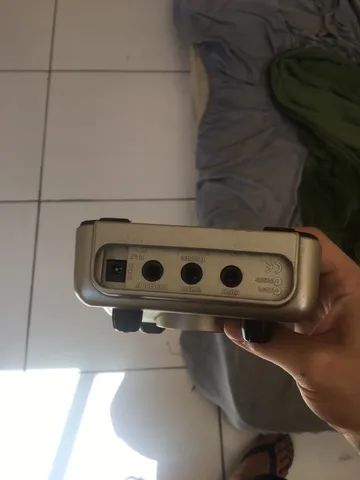 Zoom g1on na caixa manuais e cabo USB e powerbank - Instrumentos