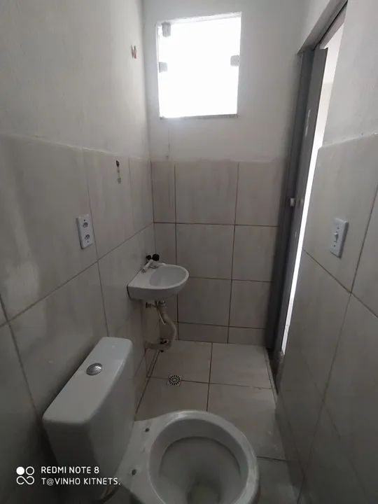 Sobrado com varanda 