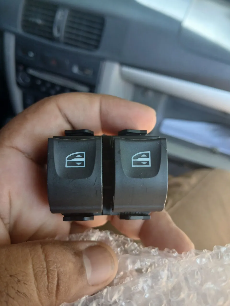 Botões de controle de vidros elétricos