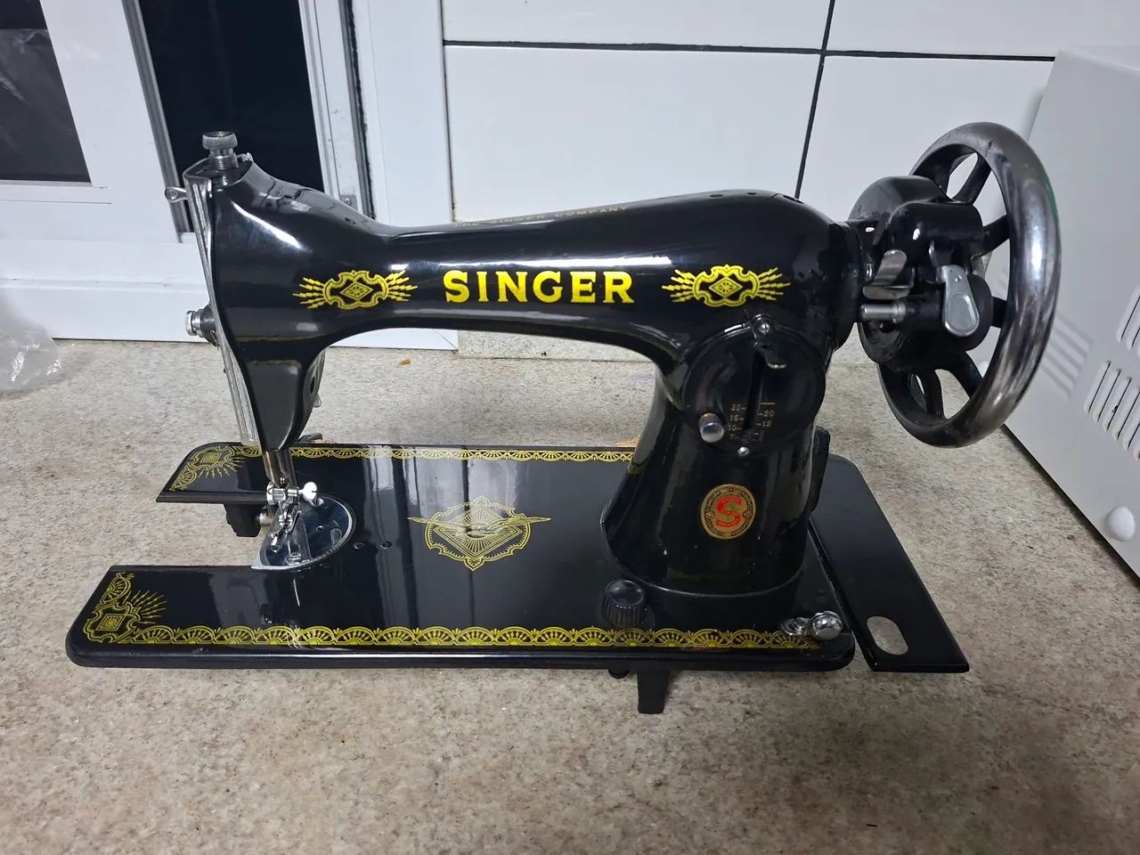 Máquina de costura Singer64684592297473121