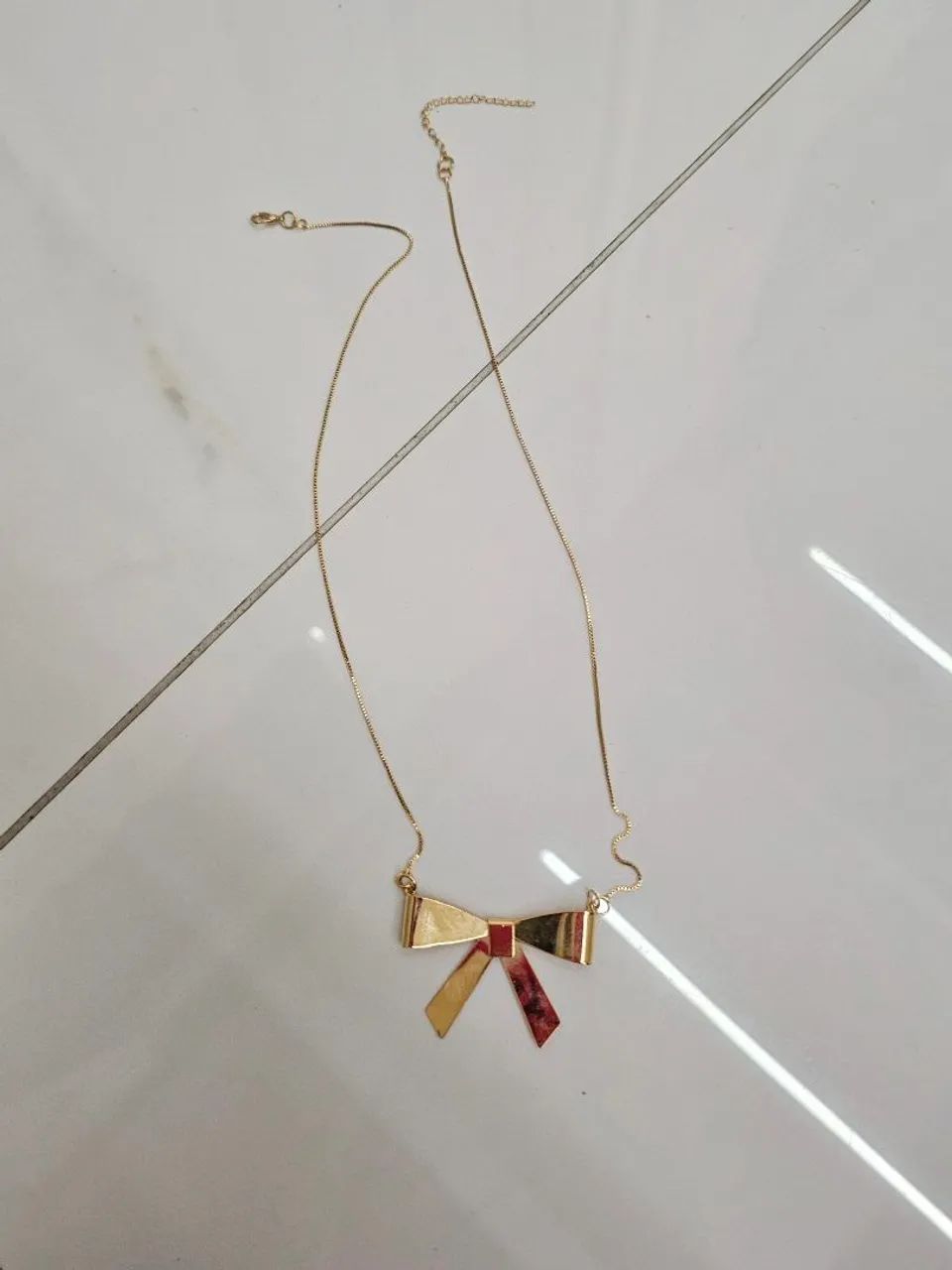 Colar de Laço Dourado