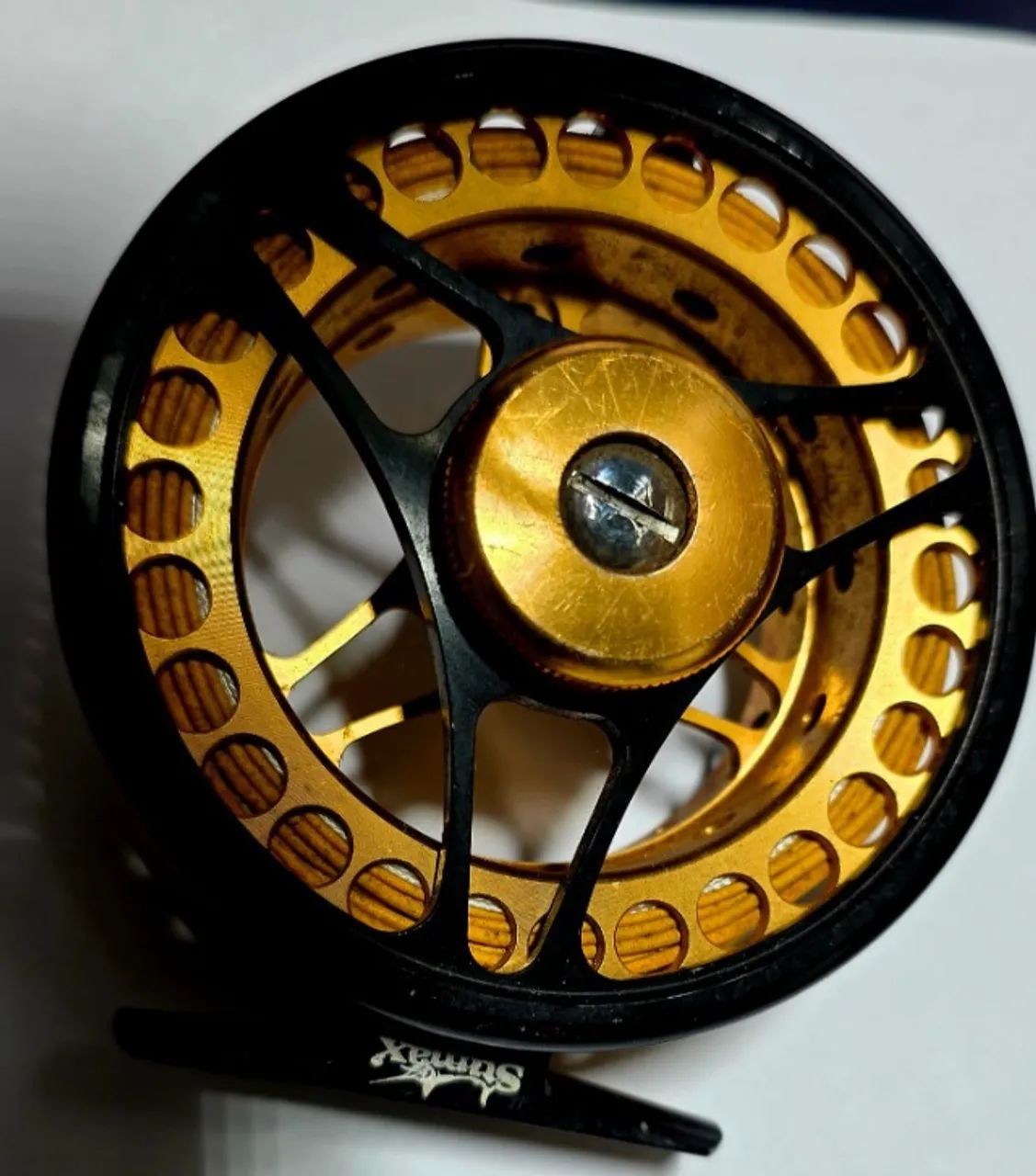 carretilha de pesca com mosca Tiny Fly