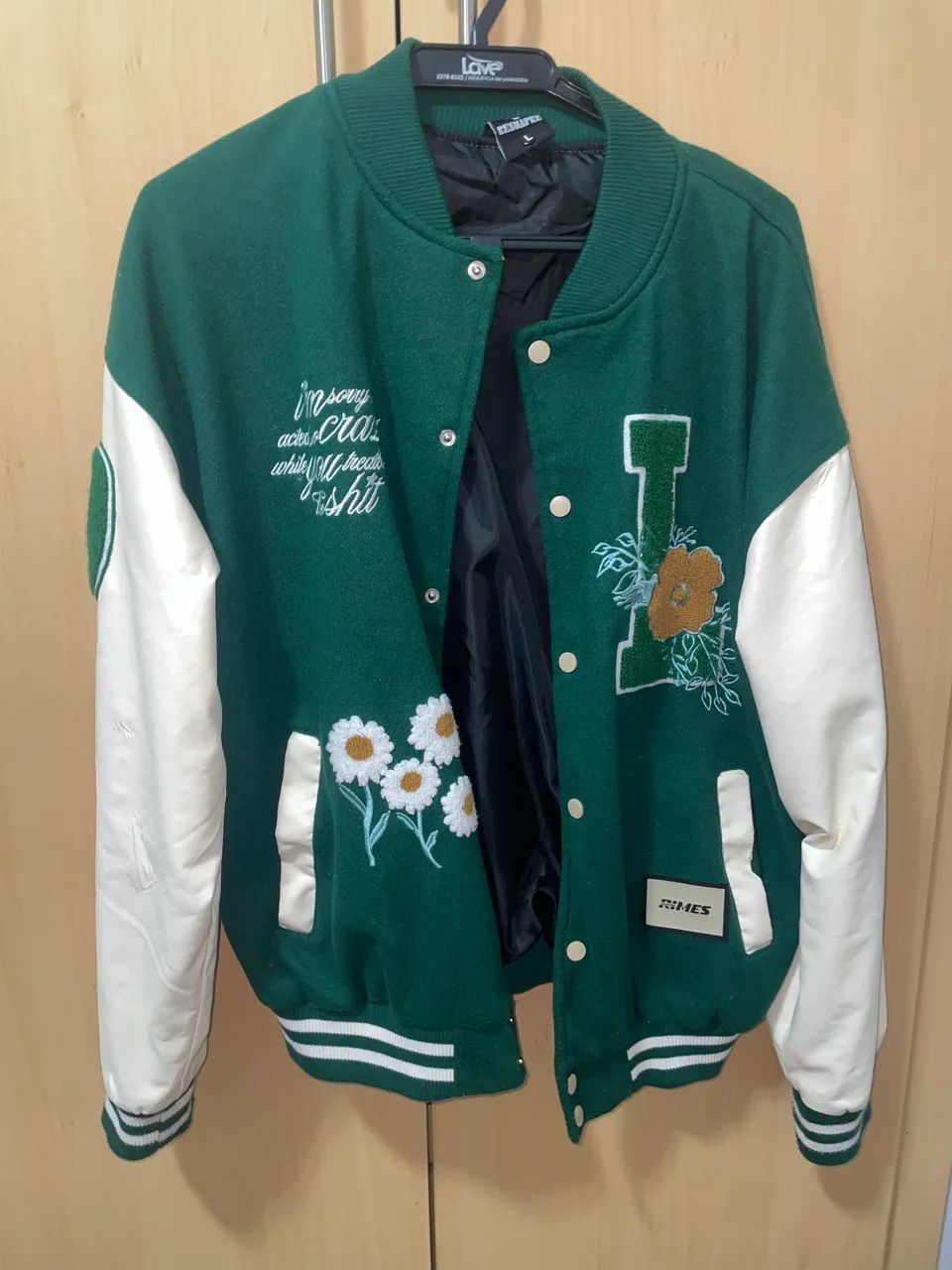 Jaqueta de couro verde e branco 