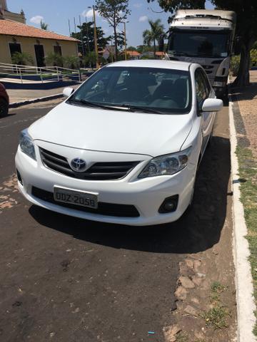 Vendo Corolla 12-13 Gli segundo dono carro conservado - Foto 2