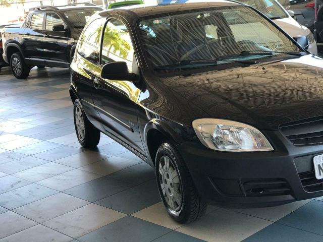 Celta 1.0 mpfi life 8v flex 2p 2011 completo único dono pneus novos super conservado - Foto 5