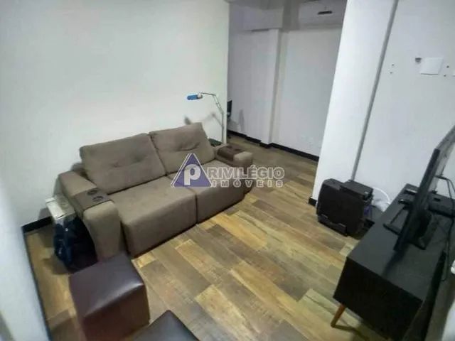 Excelente sala e quarto com vaga em Botafogo.