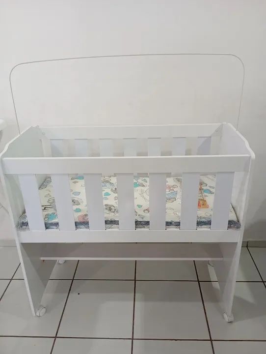 Mini berço usado uma única vez.