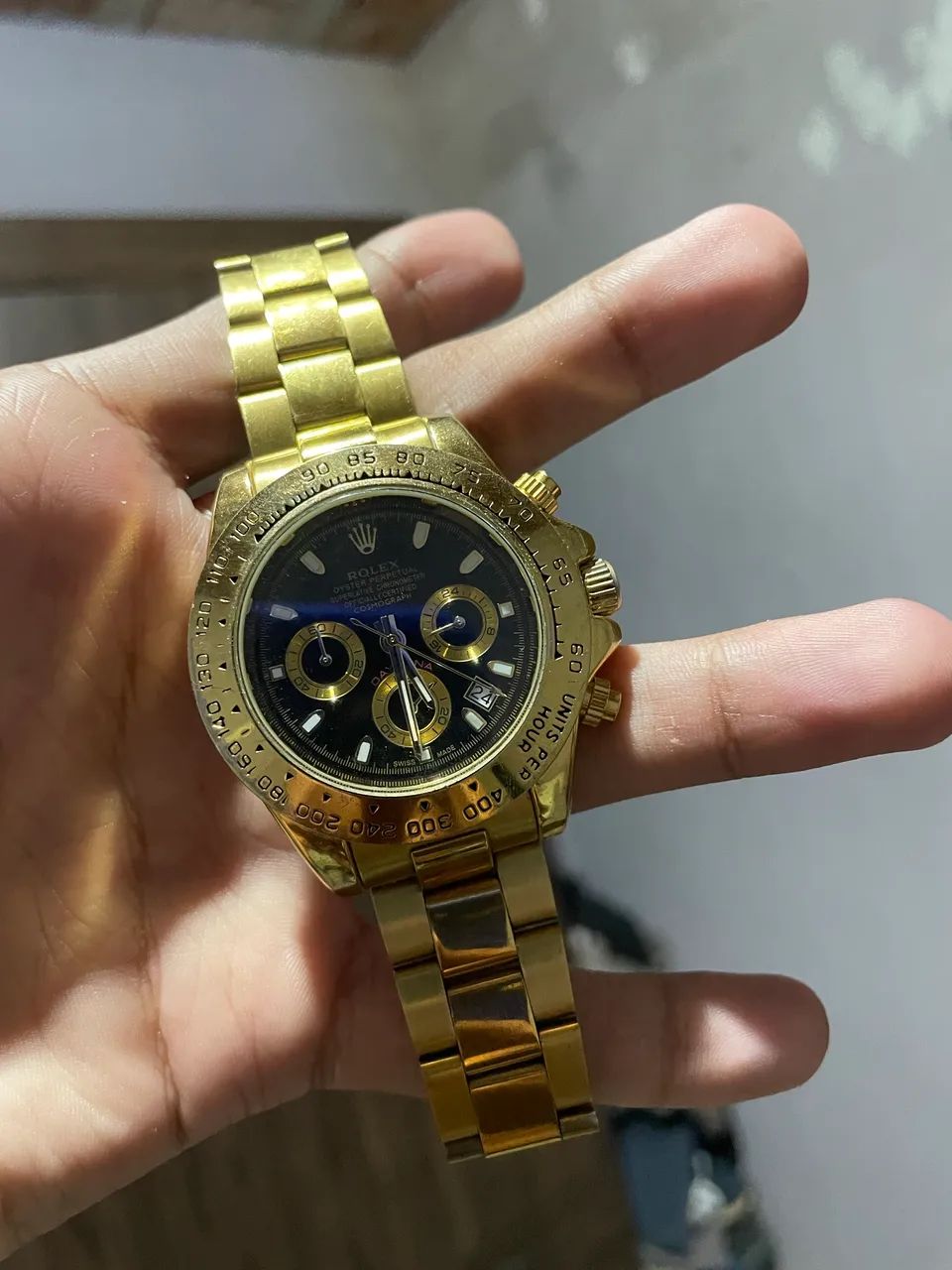Relógio estilo Daytona dourado