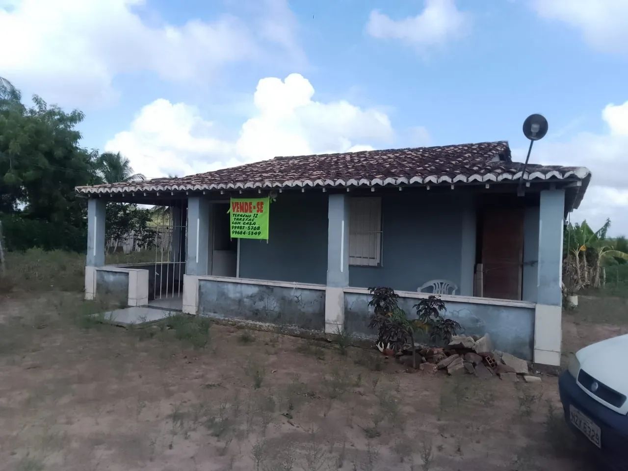 Terreno 12 tarefas com casa