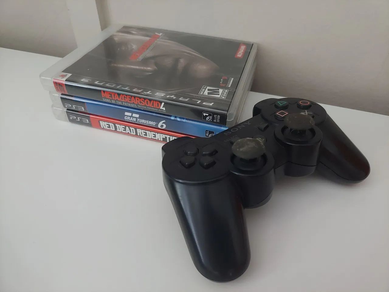 PS3 Slim 110V 1 controle e jogos  - Foto 3