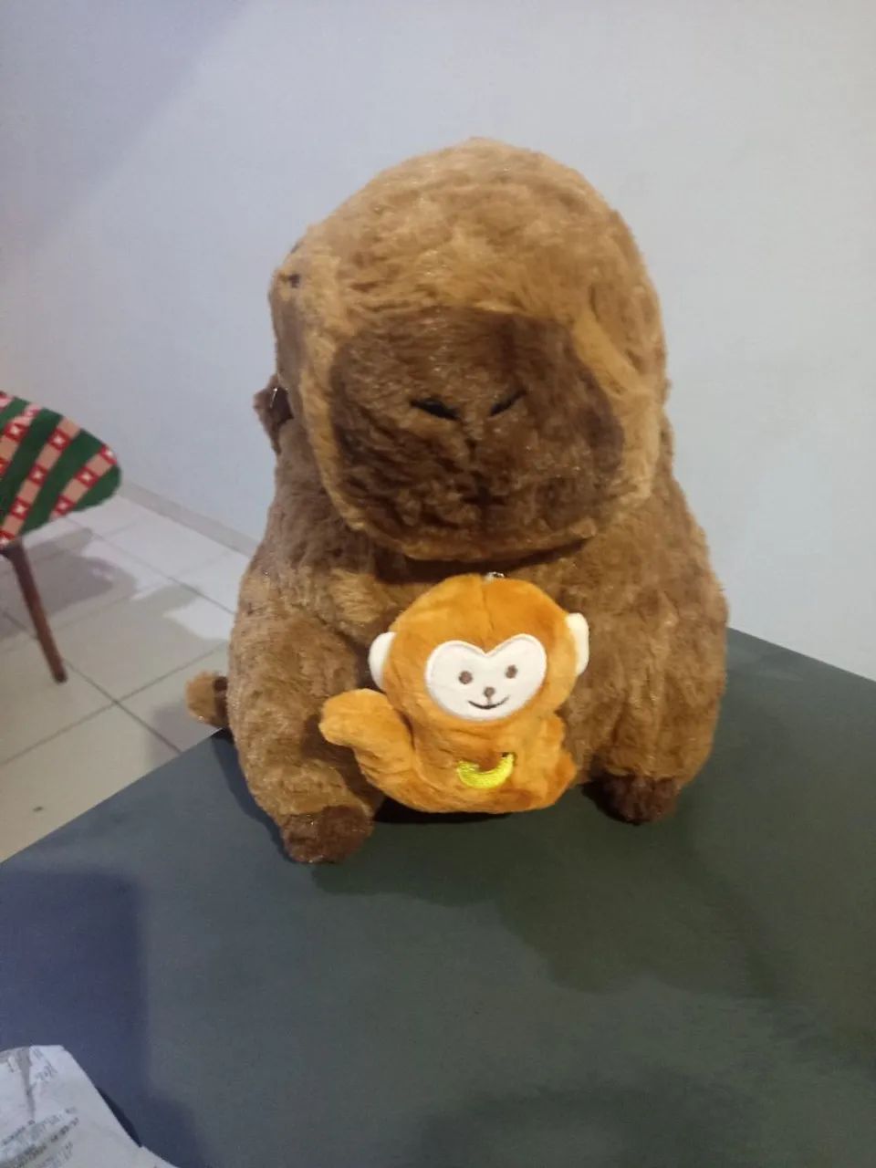 Pelucia capivara bolsa 