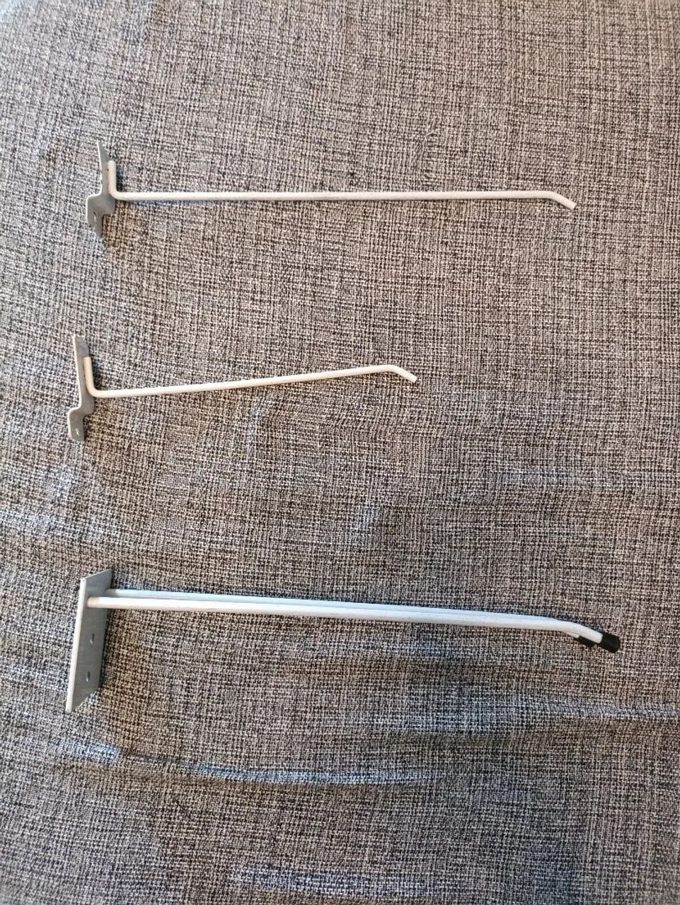 Ganchos para painéis ripados.