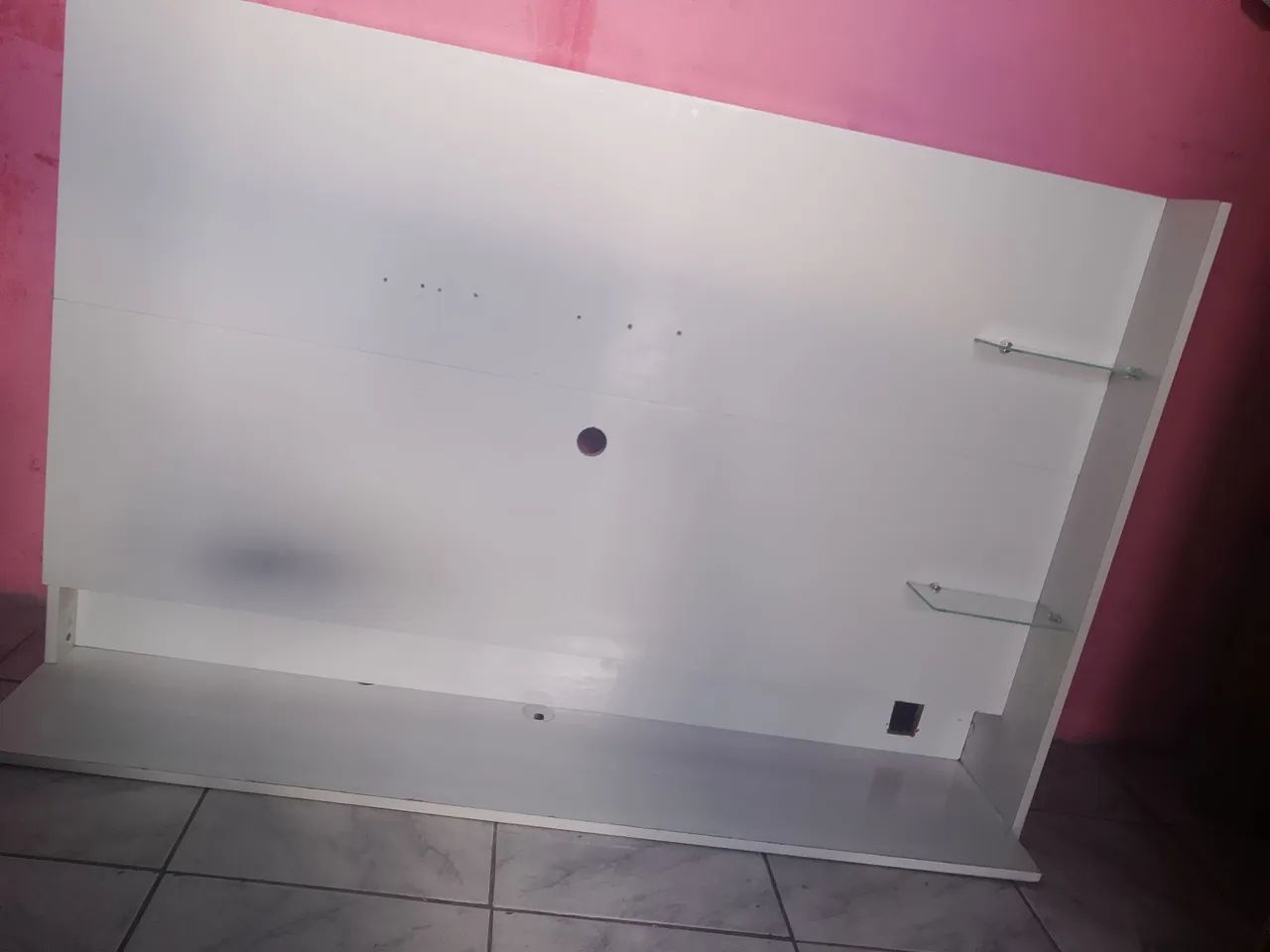 Painel com marcas de uso