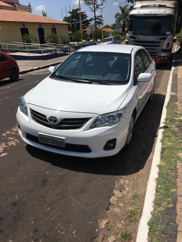 Vendo Corolla 12-13 Gli segundo dono carro conservado