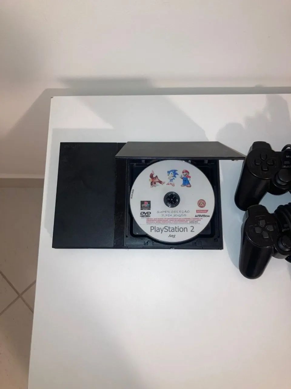 Ps2 (destravado) em excelente estado, com dois controles, e um jogo incluso - Foto 2