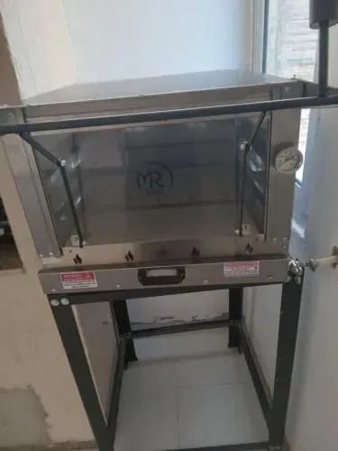 Vendo um forno semi-novo assa pão  e pizza