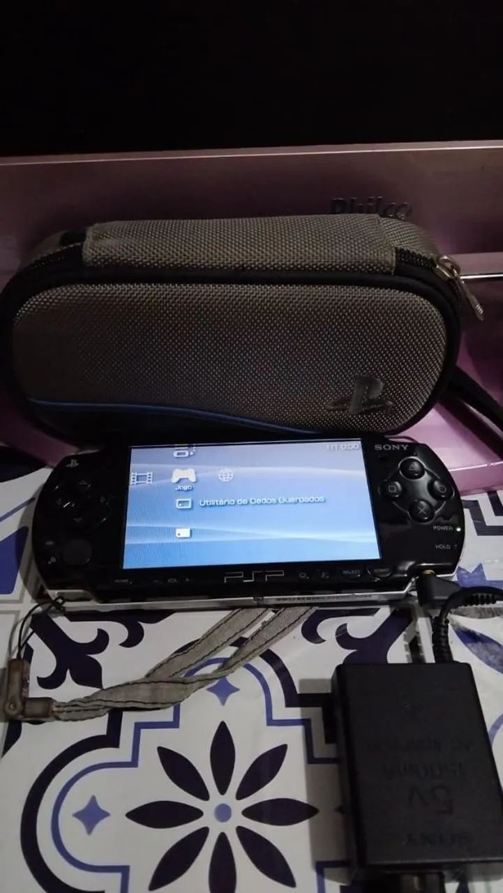 Psp funcionando perfeitamente porém nao ler jogos e vai sem bateria 