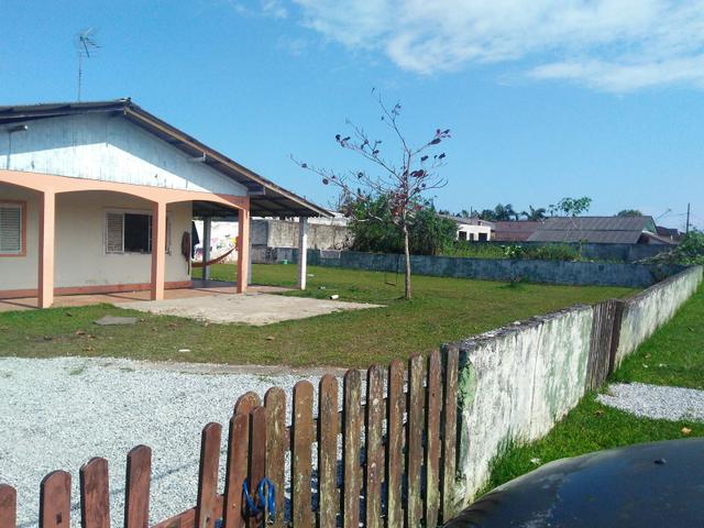 Casa com 2 terreno total de 650 metros