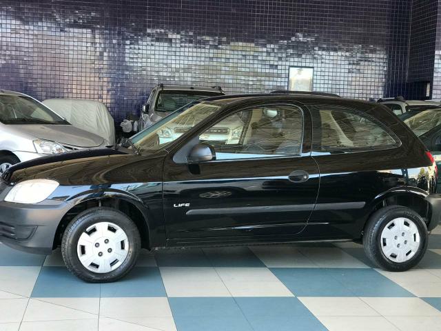 Celta 1.0 mpfi life 8v flex 2p 2011 completo único dono pneus novos super conservado