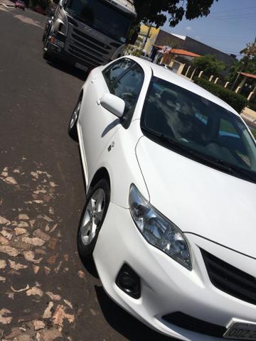 Vendo Corolla 12-13 Gli segundo dono carro conservado - Foto 3
