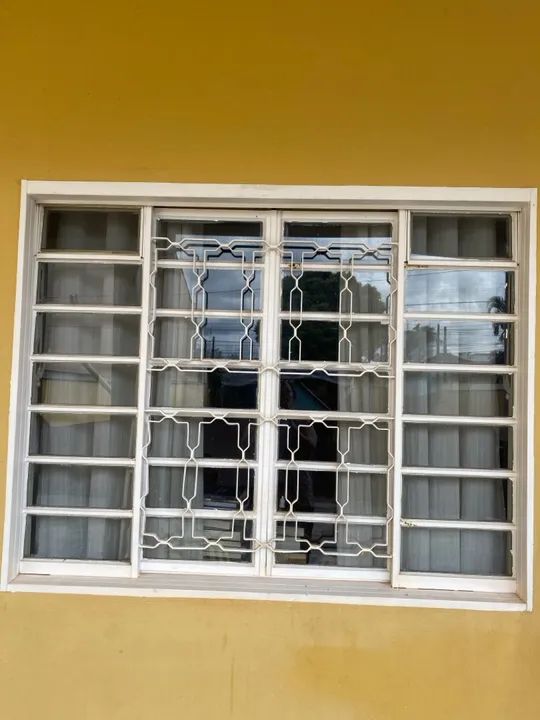 Janelas de Alumínio com Grade de Proteção