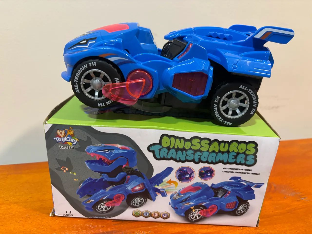 Carrinho Transformers Dinossauro Bate E Volta Sons NOVO - Foto 3