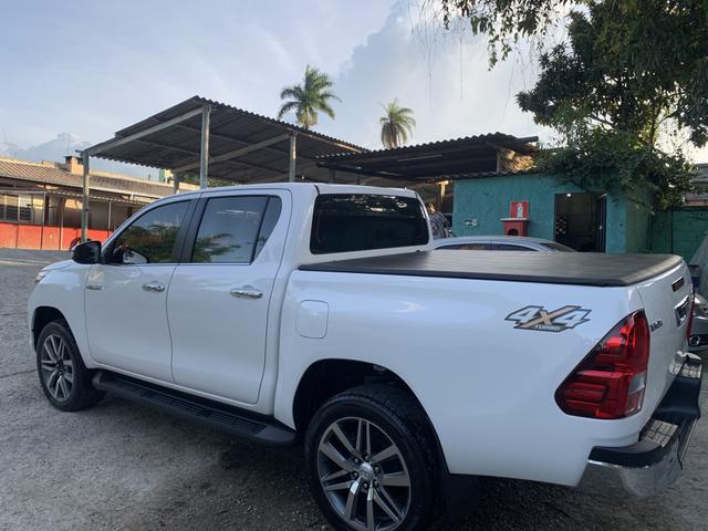 Hilux SRX 17/18 diesel leia todo anúncio - Foto 9