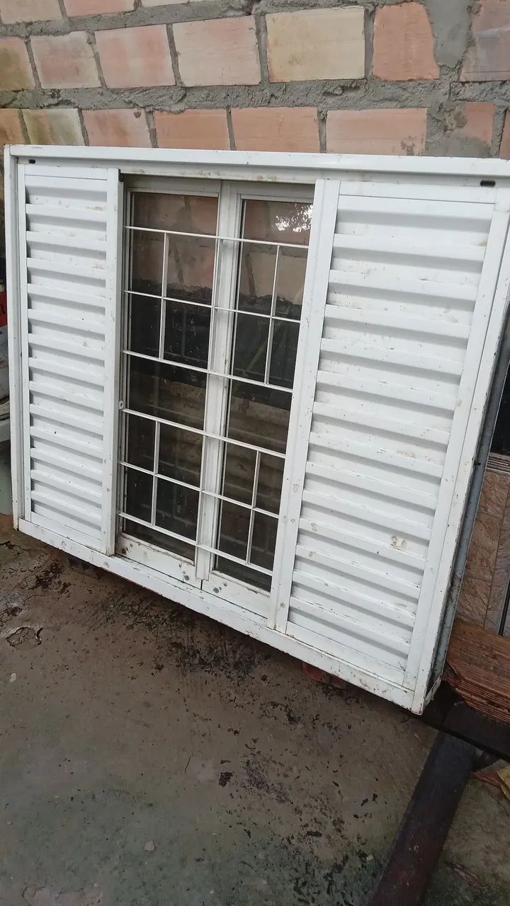 Janela de aço com grade e veneziana - Foto 5