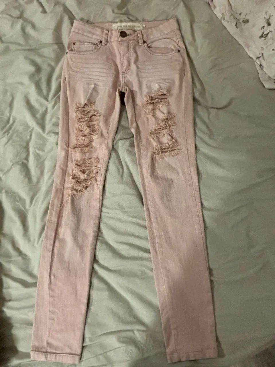 Calça jeans rosa