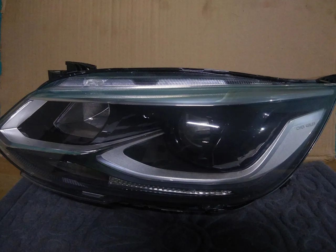 Farol lado esquerdo ONIX PLUS PREMIER