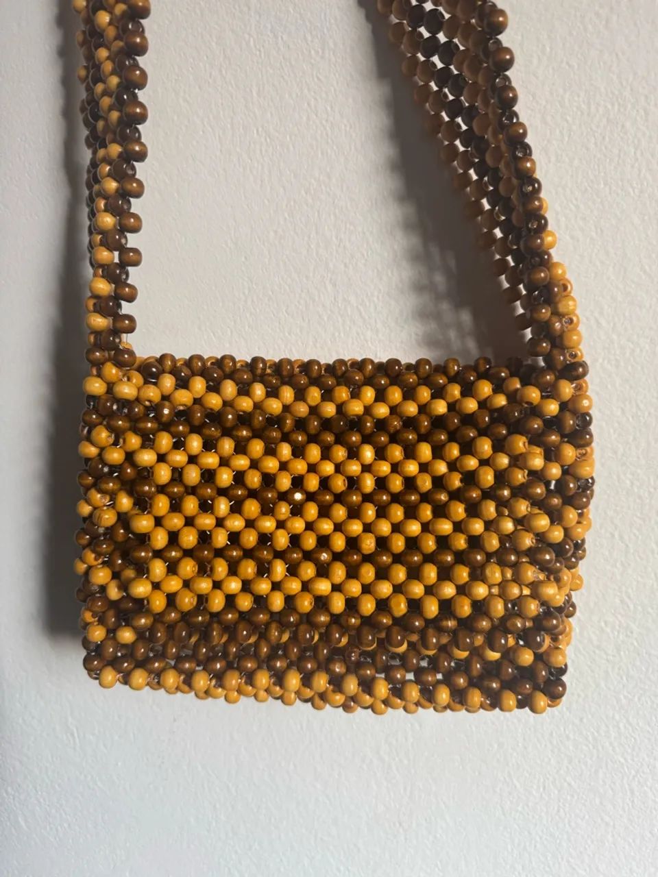 Bolsa de miçangas de madeira