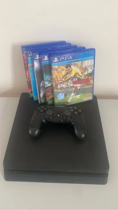 Vendo PlayStation 4 slim com controle e jogos