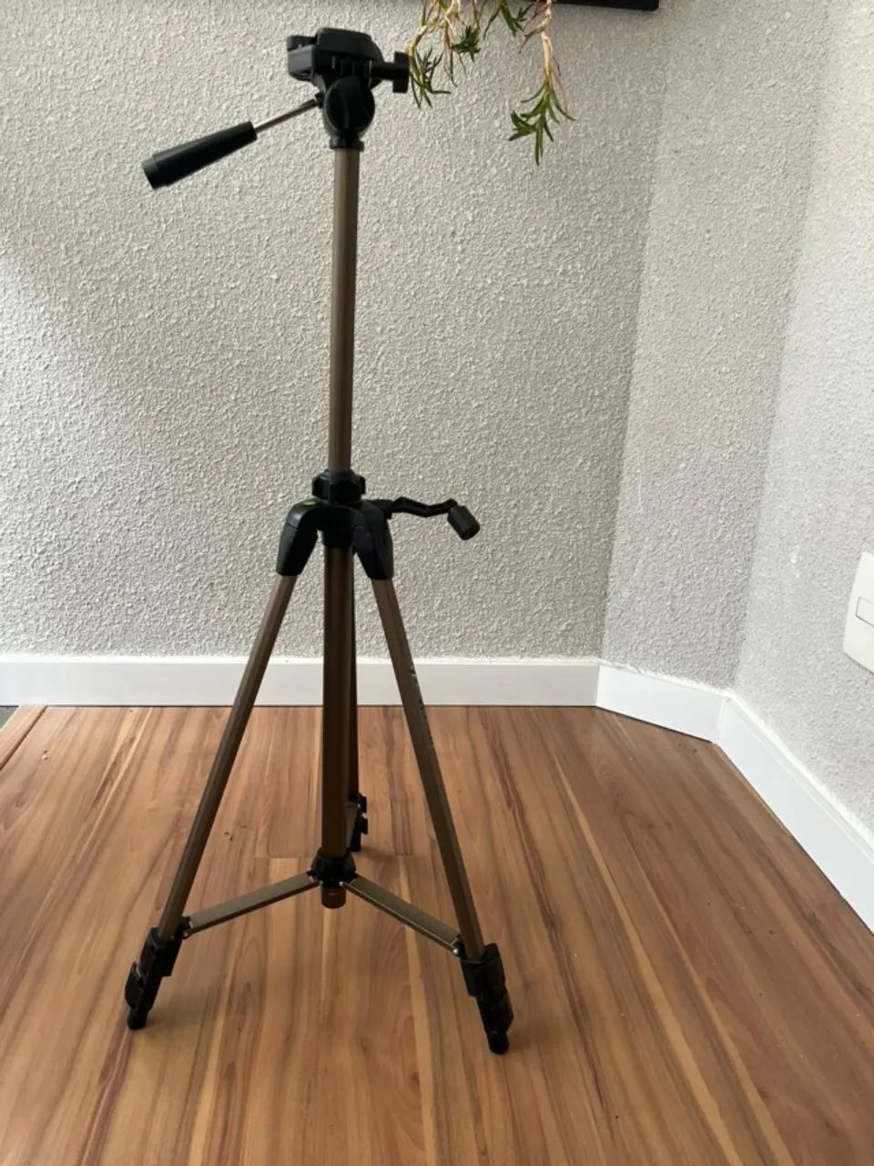 Tripé de câmera