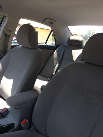 Vendo Corolla 12-13 Gli segundo dono carro conservado - Foto 6