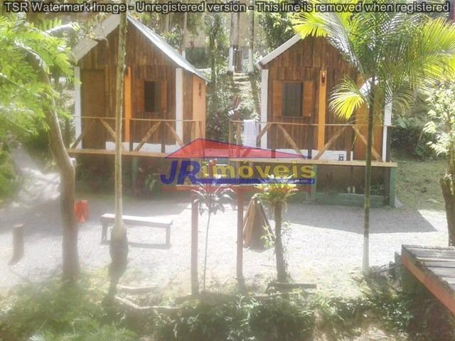 Imóvel Comercial com casa e 03 Chalés - Ref. 265