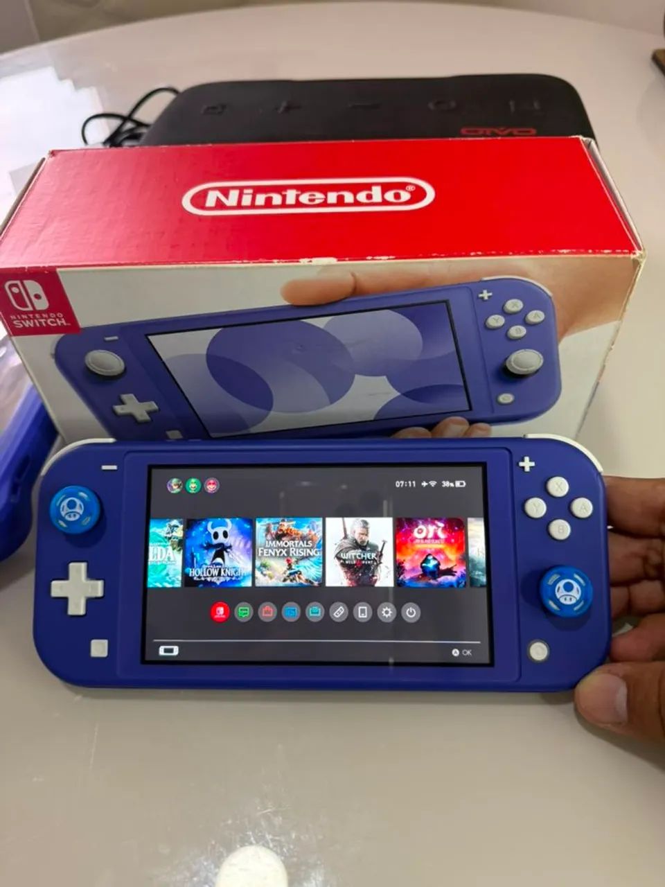 Nintendo Switch Lite Azul + 128GB - Foto 5