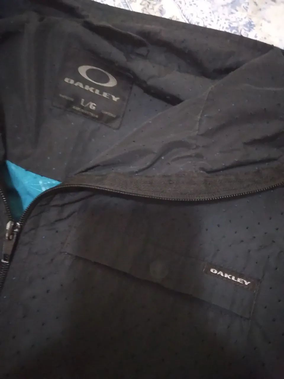 Jaqueta Oakley. Corta vento forrada azul e vermelho  - Foto 5