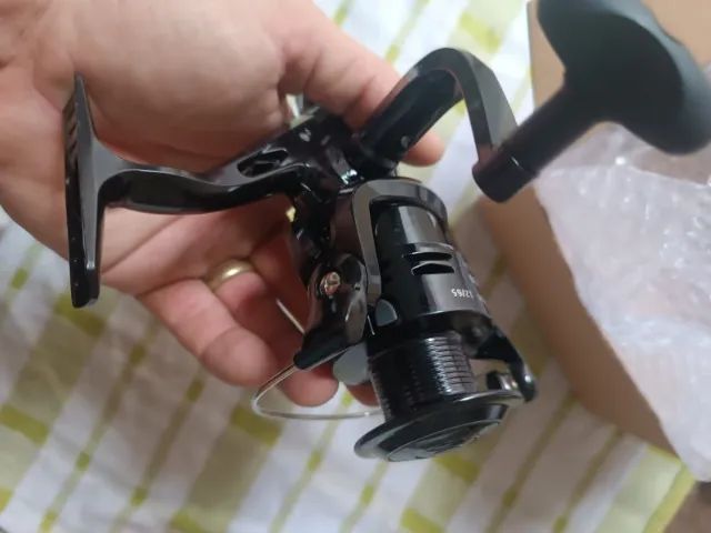 Molinete para pesca Serie 4000 novo na caixa - Foto 3