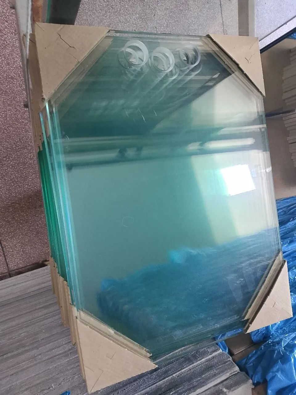 Tábua de cortar de vidro.